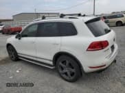 ✅ 2013 Volkswagen Touareg • VIN: WVGEG9BPXDD012733 • Lot: 91858355. Listed on Copart with 116,232 mi. Free auction sales archive from the USA and detailed vehicle history report at DreamBid. Image 2.