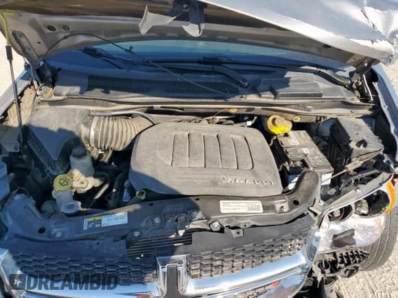 ✅ 2015 Dodge Grand Caravan SE • VIN: 2C4RDGBG4FR647983 • Lot: 82428085. Wystawiony na Copart z przebiegiem 126 627 mil. Bezpłatny archiwum sprzedaży aukcyjnych z USA i szczegółowy raport historii pojazdu na DreamBid. Zdjęcie 12.