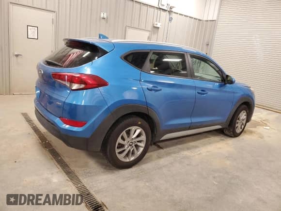 2018 Hyundai Tucson SEL with VIN KM8J3CA44JU614683, listed as a Copart auction lot 69869295 with Not provided miles and Salvage title. Bid and sale history available at DreamBid. Image 3.