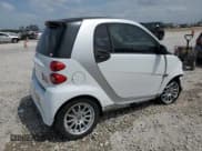 ✅ 2015 Smart fortwo Passion • VIN: WMEEJ3BA6FK807938 • Lot: 53860475. Wystawiony na Copart z przebiegiem 77 748 mil. Bezpłatny archiwum sprzedaży aukcyjnych z USA i szczegółowy raport historii pojazdu na DreamBid. Zdjęcie 3.