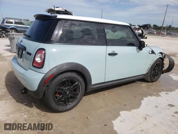 2012 MINI Hardtop with VIN WMWSU3C52CT367682, listed as a Copart auction lot 63045965 with 124,683 mi miles and Salvage title. Bid and sale history available at DreamBid. Image 3.