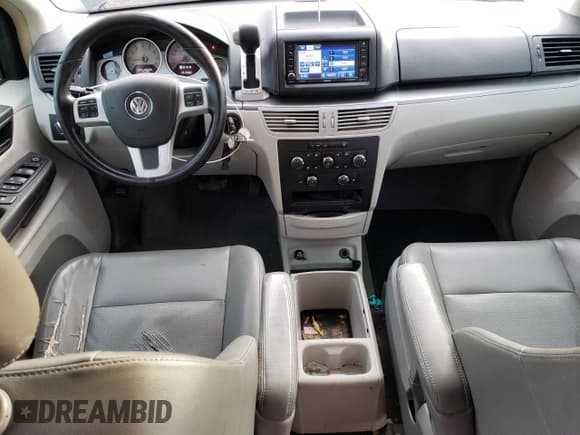 ✅ 2012 Volkswagen Routan SE • VIN: 2C4RVABG5CR292697 • Lot: 87095645. Listed on Copart with 191,922 mi. Free auction sales archive from the USA and detailed vehicle history report at DreamBid. Image 8.