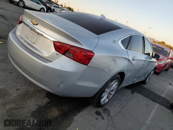 ✅ 2017 Chevrolet Impala LT • VIN: 1G1105S36HU115689 • Лот: 74004094. Опубликован ранее на Copart с пробегом 135 141 миль. Бесплатный доступ к архиву аукционных продаж из США и подробный отчёт об истории автомобиля на DreamBid. Изображение 3.
