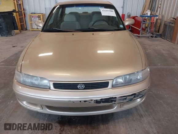 ✅ 1994 Mazda 626 DX • VIN: 1YVGE22C7R5112212 • Лот: 42207980. Опубликован ранее на IAAI с пробегом 128 688 миль. Бесплатный доступ к архиву аукционных продаж из США и подробный отчёт об истории автомобиля на DreamBid. Изображение 12.