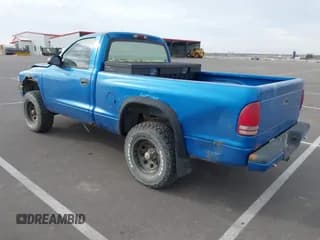 ✅ 1999 Dodge Dakota • VIN: 1B7GG26X5XS296142 • Lot: 41486667. Wystawiony na IAAI z przebiegiem 185 436 mil. Bezpłatny archiwum sprzedaży aukcyjnych z USA i szczegółowy raport historii pojazdu na DreamBid. Zdjęcie 3.
