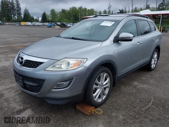 ✅ 2012 Mazda CX-9 Grand Touring • VIN: JM3TB3DV2C0367606 • Лот: 42156984. Опубликован ранее на IAAI с пробегом 101 347 миль. Бесплатный доступ к архиву аукционных продаж из США и подробный отчёт об истории автомобиля на DreamBid. Изображение 2.