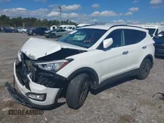 2016 Hyundai Santa Fe z VIN 5XYZUDLB2GG368085, wystawiony jako IAAI lot #43321413 z przebiegiem 168 280 mil mil oraz . Historia ofert i sprzedaży dostępna na DreamBid. Obrazek 2.