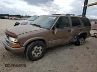 2002 Chevrolet Blazer LS z VIN 1GNDT13W42K216527, wystawiony jako Copart lot #78736754 z przebiegiem 212 774 mil mil oraz Szkoda całkowita • Salvage title. Historia ofert i sprzedaży dostępna na DreamBid. Obrazek 1.