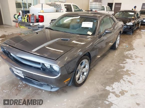 ✅ 2013 Dodge Challenger SXT • VIN: 2C3CDYAG9DH629189 • Lot: 41374015. Wystawiony na IAAI z przebiegiem Nie podano. Bezpłatny archiwum sprzedaży aukcyjnych z USA i szczegółowy raport historii pojazdu na DreamBid. Zdjęcie 2.