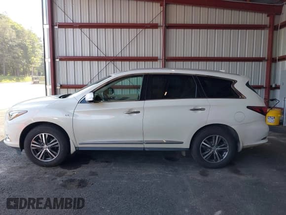 ✅ 2020 Infiniti QX60 Luxe • VIN: 5N1DL0MMXLC522672 • Lot: 42777815. Listed on IAAI with 69,134 mi. Free auction sales archive from the USA and detailed vehicle history report at DreamBid. Image 14.