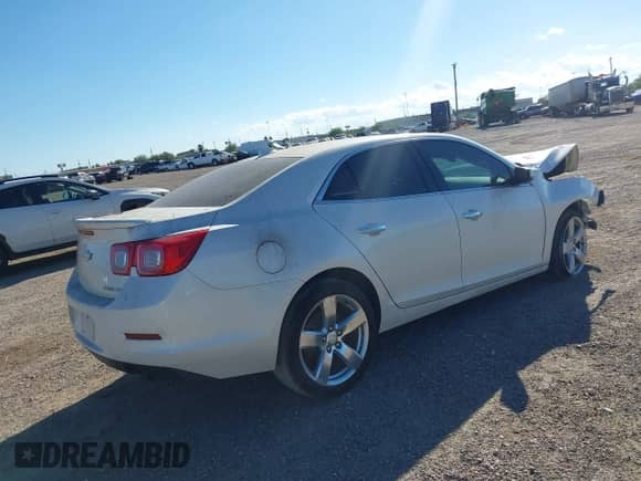 2014 Chevrolet Malibu LTZ with VIN 1G11J5SX9EF174025, listed as a IAAI auction lot 43438961 with Not provided miles and . Bid and sale history available at DreamBid. Image 4.