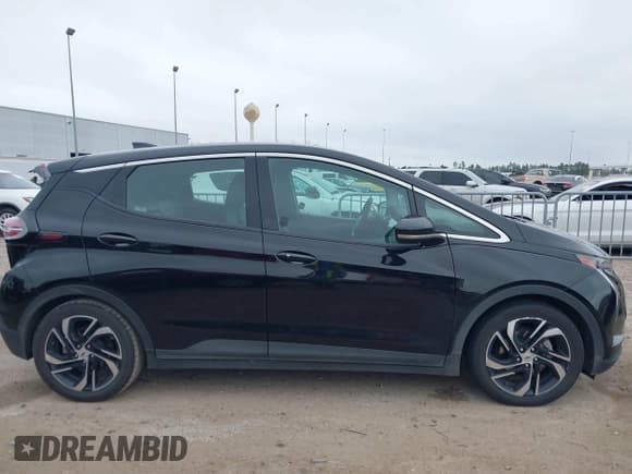 ✅ 2023 Chevrolet Bolt EV 2LT • VIN: 1G1FX6S02P4143467 • Lot: 41607322. Wystawiony na IAAI z przebiegiem 95 398 mil. Bezpłatny archiwum sprzedaży aukcyjnych z USA i szczegółowy raport historii pojazdu na DreamBid. Zdjęcie 13.
