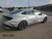 2025 Hyundai Sonata SEL z VIN KMHL64JA3SA480036, wystawiony jako Copart lot #85410325 z przebiegiem 9 363 mil mil oraz Czysty tytuł • Clean title. Historia ofert i sprzedaży dostępna na DreamBid. Obrazek 3.