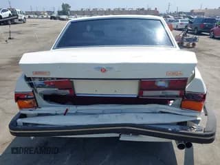 ✅ 1990 Bentley Turbo R • VIN: SCBZR03DXLCX32699 • Lot: 42960582. Wystawiony na IAAI z przebiegiem 38 147 mil. Bezpłatny archiwum sprzedaży aukcyjnych z USA i szczegółowy raport historii pojazdu na DreamBid. Zdjęcie 6.