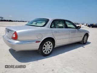 ✅ 2004 Jaguar XJ 8 • VIN: SAJEA71C34SG03026 • Lot: 60803165. Wystawiony na Copart z przebiegiem 96 219 mil. Bezpłatny archiwum sprzedaży aukcyjnych z USA i szczegółowy raport historii pojazdu na DreamBid. Zdjęcie 3.