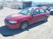 ✅ 2000 Toyota Corolla CE • VIN: 1NXBR12E0YZ414599 • Lot: 40203047. Wystawiony na IAAI z przebiegiem 192 914 mil. Bezpłatny archiwum sprzedaży aukcyjnych z USA i szczegółowy raport historii pojazdu na DreamBid. Zdjęcie 2.