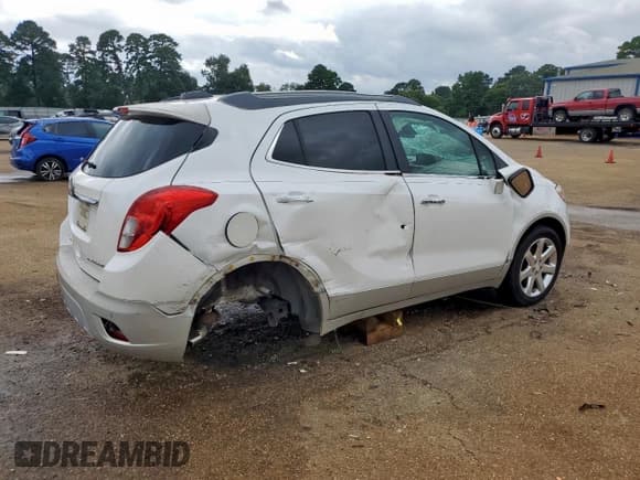 ✅ 2015 Buick Encore Premium • VIN: KL4CJDSB0FB207978 • Лот: 81803215. Опубликован ранее на Copart с пробегом 92 145 миль. Бесплатный доступ к архиву аукционных продаж из США и подробный отчёт об истории автомобиля на DreamBid. Изображение 3.