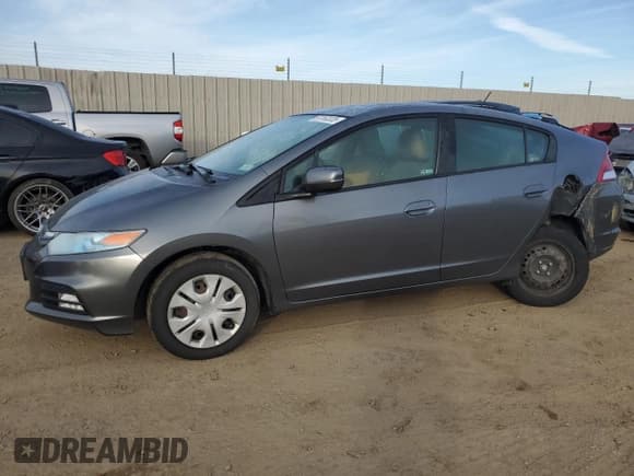 ✅ 2012 Honda Insight • VIN: JHMZE2H32CS000284 • Lot: 50160335. Listed on Copart with 64,074 mi. Free auction sales archive from the USA and detailed vehicle history report at DreamBid. Image 1.