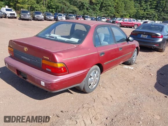✅ 1995 Toyota Corolla DX • VIN: 1NXAE09B2SZ351932 • Lot: 42799949. Listed on IAAI with 85,534 mi. Free auction sales archive from the USA and detailed vehicle history report at DreamBid. Image 4.