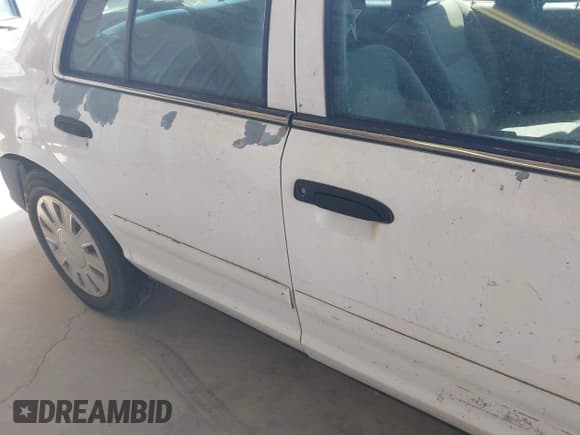 ✅ 2007 Ford Police Interceptor • VIN: 2FAFP71W47X128454 • Lot: 42079360. Wystawiony na IAAI z przebiegiem 263 185 mil. Bezpłatny archiwum sprzedaży aukcyjnych z USA i szczegółowy raport historii pojazdu na DreamBid. Zdjęcie 18.