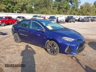 ✅ 2018 Toyota Corolla LE • VIN: 5YFBURHE1JP815087 • Lot: 43522480. Listed on IAAI with 97,514 mi. Free auction sales archive from the USA and detailed vehicle history report at DreamBid. Image 1.