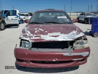 ✅ 2001 Kia Sephia • VIN: KNAFB121115074609 • Lot: 72346144. Wystawiony na Copart z przebiegiem 88 400 mil. Bezpłatny archiwum sprzedaży aukcyjnych z USA i szczegółowy raport historii pojazdu na DreamBid. Zdjęcie 5.