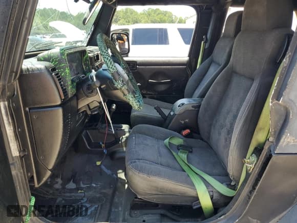 ✅ 2004 Jeep Wrangler Rubicon • VIN: 1J4FA69S74P769357 • Lot: 65425525. Wystawiony na Copart z przebiegiem 125 486 mil. Bezpłatny archiwum sprzedaży aukcyjnych z USA i szczegółowy raport historii pojazdu na DreamBid. Zdjęcie 7.