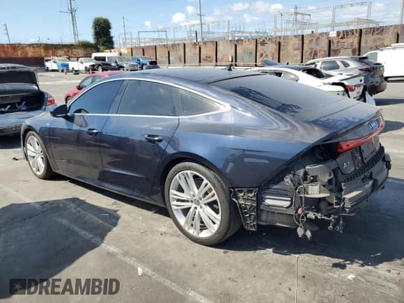 ✅ 2019 Audi A7 Premium Plus • VIN: WAUU2AF29KN058475 • Лот: 71855505. Опубликован ранее на Copart с пробегом 75 344 миль. Бесплатный доступ к архиву аукционных продаж из США и подробный отчёт об истории автомобиля на DreamBid. Изображение 2.