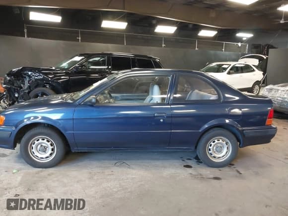 ✅ 1996 Toyota Tercel DX • VIN: JT2AC52L9T0139217 • Lot: 41898808. Wystawiony na IAAI z przebiegiem 86 500 mil. Bezpłatny archiwum sprzedaży aukcyjnych z USA i szczegółowy raport historii pojazdu na DreamBid. Zdjęcie 14.