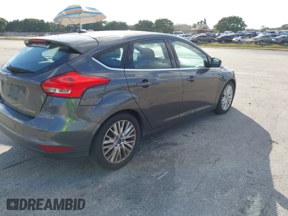 ✅ 2017 Ford Focus Titanium • VIN: 1FADP3N28HL206742 • Лот: 43807219. Опубликован ранее на IAAI с пробегом 118 232 миль. Бесплатный доступ к архиву аукционных продаж из США и подробный отчёт об истории автомобиля на DreamBid. Изображение 4.