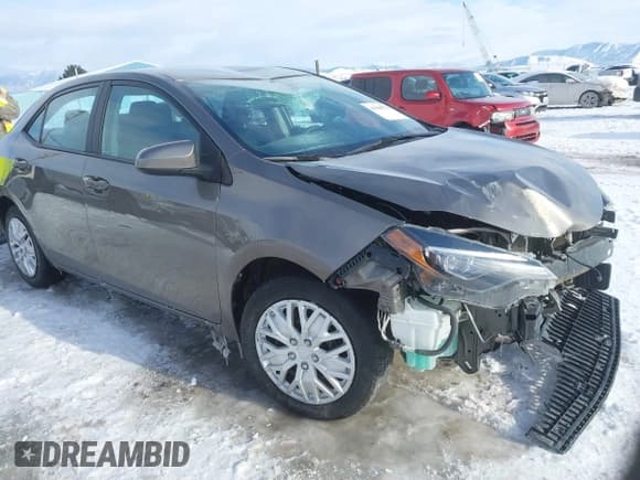 ✅ 2018 Toyota Corolla L • VIN: 2T1BURHE1JC009489 • Lot: 41560721. Listed on IAAI with 102,667 mi. Free auction sales archive from the USA and detailed vehicle history report at DreamBid. Image 1.