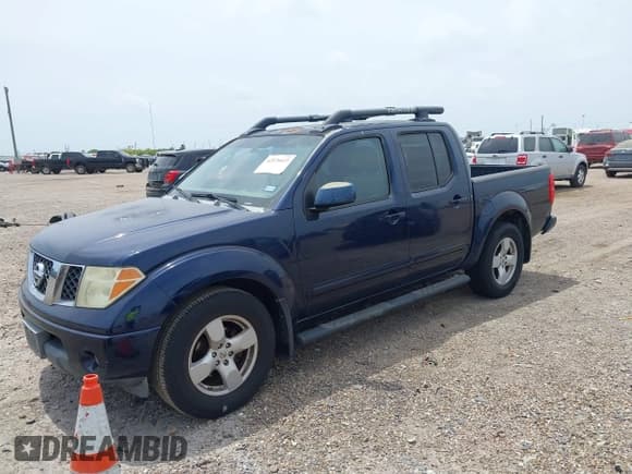 ✅ 2007 Nissan Frontier SE • VIN: 1N6AD07UX7C439603 • Lot: 42070415. Listed on IAAI with 163,826 mi. Free auction sales archive from the USA and detailed vehicle history report at DreamBid. Image 2.