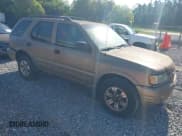 ✅ 2001 Isuzu Rodeo S • VIN: 4S2CK58W714300131 • Lot: 42993854. Wystawiony na IAAI z przebiegiem 332 181 mil. Bezpłatny archiwum sprzedaży aukcyjnych z USA i szczegółowy raport historii pojazdu na DreamBid. Zdjęcie 1.