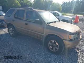 ✅ 2001 Isuzu Rodeo S • VIN: 4S2CK58W714300131 • Лот: 42993854. Опубликован ранее на IAAI с пробегом 332 181 миль. Бесплатный доступ к архиву аукционных продаж из США и подробный отчёт об истории автомобиля на DreamBid. Изображение 1.