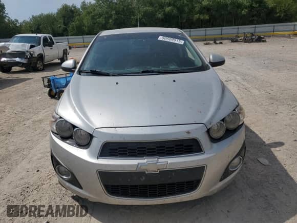 2012 Chevrolet Sonic LTZ с VIN 1G1JE5SH8C4108328, выставлен на аукционе Copart как лот 80509915 с пробегом 111 625 миль миль и Списание • Salvage title. История ставок и продаж доступна на DreamBid. Изображение 5.