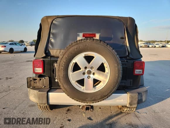 ✅ 2008 Jeep Wrangler Sahara • VIN: 1J8FA54158L589606 • Лот: 82117285. Опубликован ранее на Copart с пробегом 143 741 миль. Бесплатный доступ к архиву аукционных продаж из США и подробный отчёт об истории автомобиля на DreamBid. Изображение 6.
