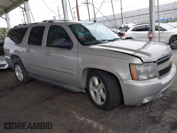 ✅ 2007 Chevrolet Suburban LT • VIN: 1GNFC16027J221478 • Lot: 42795291. Listed on IAAI with 160,596 mi. Free auction sales archive from the USA and detailed vehicle history report at DreamBid. Image 1.