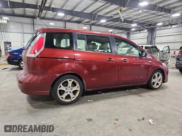 ✅ 2010 Mazda 5 Touring • VIN: JM1CR2W30A0382239 • Лот: 72006085. Опубликован ранее на Copart с пробегом 264 967 миль. Бесплатный доступ к архиву аукционных продаж из США и подробный отчёт об истории автомобиля на DreamBid. Изображение 3.