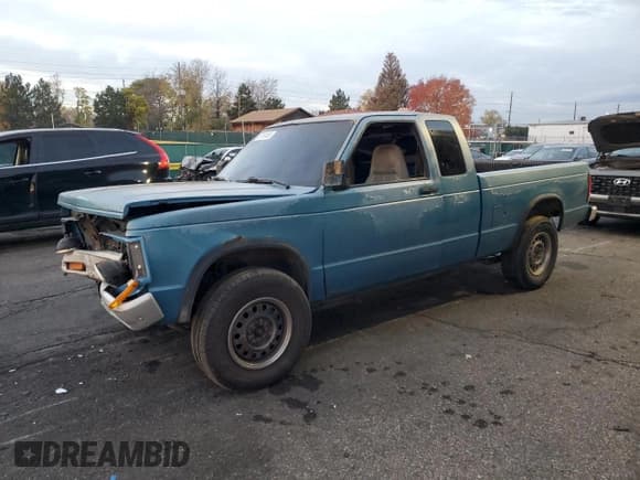 ✅ 1992 GMC Sonoma • VIN: 1GTDT19Z5N8503404 • Лот: 87124495. Опубликован ранее на Copart с пробегом 215 923 миль. Бесплатный доступ к архиву аукционных продаж из США и подробный отчёт об истории автомобиля на DreamBid. Изображение 1.