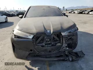 ✅ 2024 BMW iX xDrive50 • VIN: WB523CF0XRCN71950 • Lot: 65383745. Wystawiony na Copart z przebiegiem 36 375 mil. Bezpłatny archiwum sprzedaży aukcyjnych z USA i szczegółowy raport historii pojazdu na DreamBid. Zdjęcie 5.