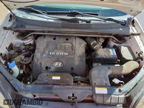 2007 Hyundai Tucson SE с VIN KM8JN72D87U670120, выставлен на аукционе Copart как лот 70221235 с пробегом 49 076 миль миль и Списание • Salvage title. История ставок и продаж доступна на DreamBid. Изображение 11.