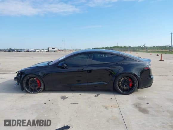 ✅ 2023 Tesla Model S Plaid • VIN: 5YJSA1E64PF518519 • Lot: 43148961. Listed on IAAI with 23,845 mi. Free auction sales archive from the USA and detailed vehicle history report at DreamBid. Image 14.