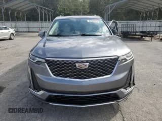 ✅ 2022 Cadillac XT6 Premium Luxury • VIN: 1GYKPCRSXNZ108228 • Lot: 82348925. Wystawiony na Copart z przebiegiem Nie podano. Bezpłatny archiwum sprzedaży aukcyjnych z USA i szczegółowy raport historii pojazdu na DreamBid. Zdjęcie 5.