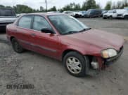 ✅ 2001 Suzuki Esteem GL • VIN: JS2GB41S515201399 • Lot: 57445725. Listed on Copart with 177,646 mi. Free auction sales archive from the USA and detailed vehicle history report at DreamBid. Image 4.