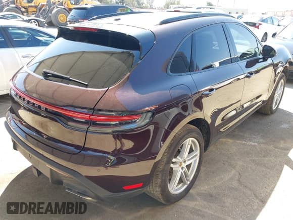 ✅ 2024 Porsche Macan • VIN: WP1AA2A55RLB10527 • Lot: 41994396. Listed on IAAI with 6,779 mi. Free auction sales archive from the USA and detailed vehicle history report at DreamBid. Image 4.