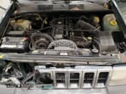 ✅ 1996 Jeep Grand Cherokee Laredo • VIN: 1J4GZ58S9TC198257 • Lot: 93327175. Listed on Copart with 169,183 mi. Free auction sales archive from the USA and detailed vehicle history report at DreamBid. Image 12.