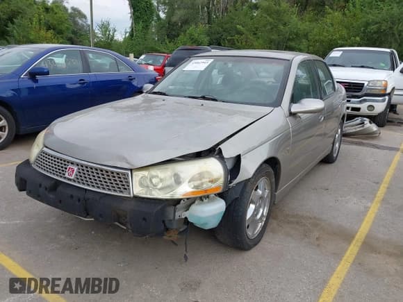 ✅ 2003 Saturn LS • VIN: 1G8JU54F23Y579397 • Lot: 43062943. Listed on IAAI with 184,144 mi. Free auction sales archive from the USA and detailed vehicle history report at DreamBid. Image 2.