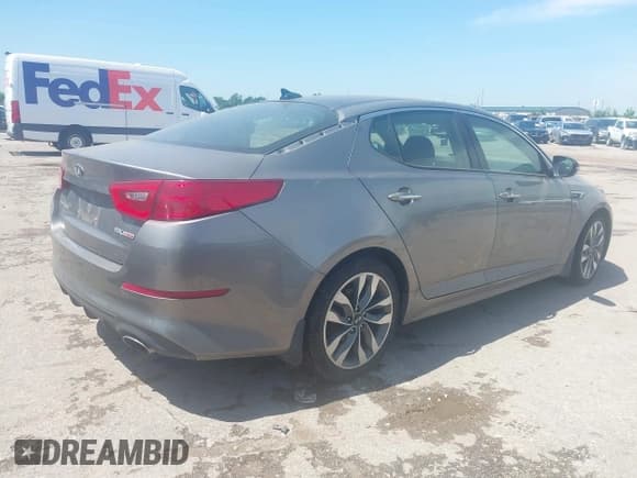 ✅ 2014 Kia Optima SXL Turbo • VIN: 5XXGR4A66EG299014 • Lot: 42359381. Listed on IAAI with 150,027 mi. Free auction sales archive from the USA and detailed vehicle history report at DreamBid. Image 4.