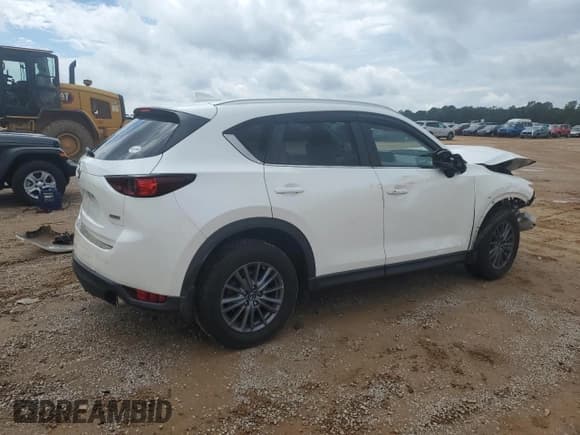 ✅ 2019 Mazda CX-5 Touring • VIN: JM3KFACM2K1649069 • Лот: 81802535. Опубликован ранее на Copart с пробегом 110 701 миль. Бесплатный доступ к архиву аукционных продаж из США и подробный отчёт об истории автомобиля на DreamBid. Изображение 3.