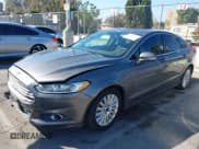 ✅ 2013 Ford Fusion SE Hybrid • VIN: 3FA6P0LU3DR345118 • Lot: 43481472. Listed on IAAI with 216,015 mi. Free auction sales archive from the USA and detailed vehicle history report at DreamBid. Image 2.